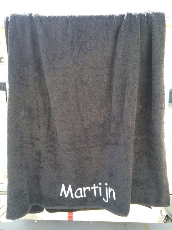 Strandlaken met borduring