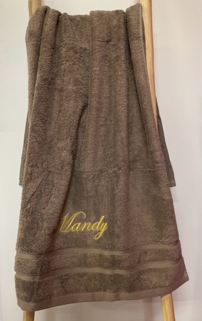 Hotel badlakens met borduring