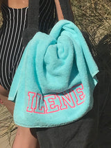 Strandlaken met borduring