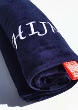 Velours strandlaken met borduring